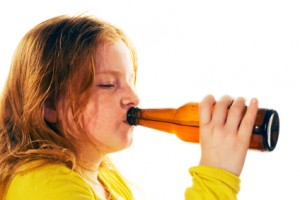 child drinks beer